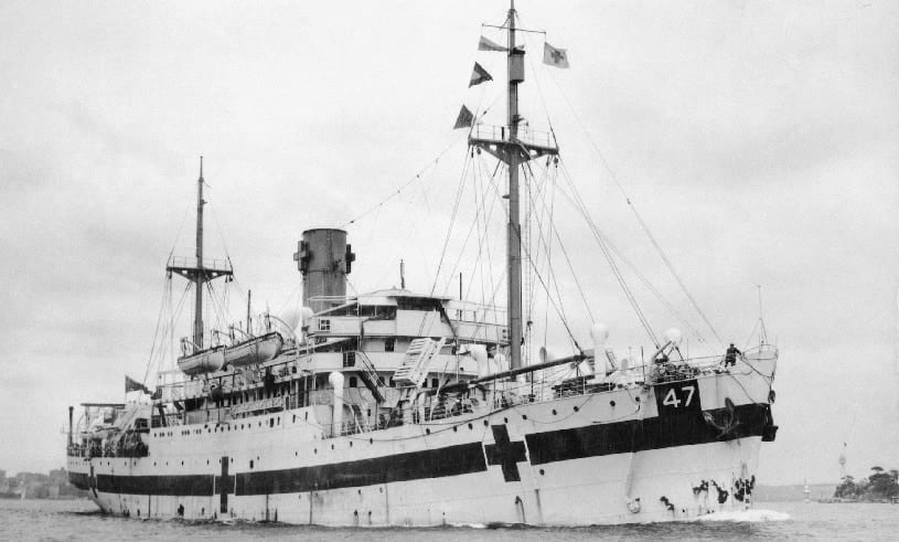 Black and white photograph of Australian Hospital Shop Centaur at sea. The red cross symbols to signify that it was a medical ship are clearly visible of the ship's hull/