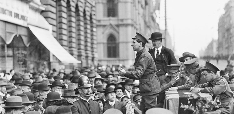 A returned soldier addresses a crowd in Collins Street in support of the second conscription referendum, 1917  Australian War Memorial (J00336)