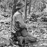 Second Lieutenant David Sabben in the rubber plantation on the morning after the battle 