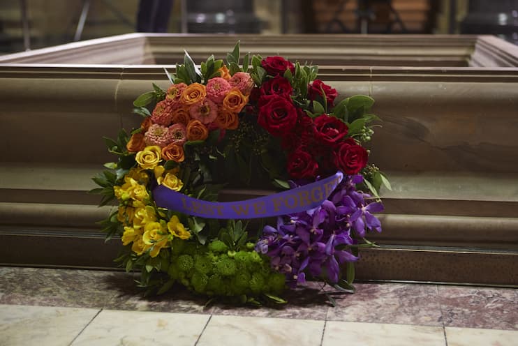 A colourful wreath positioned at the Stone of Remembrance at the Shrine in Melbourne