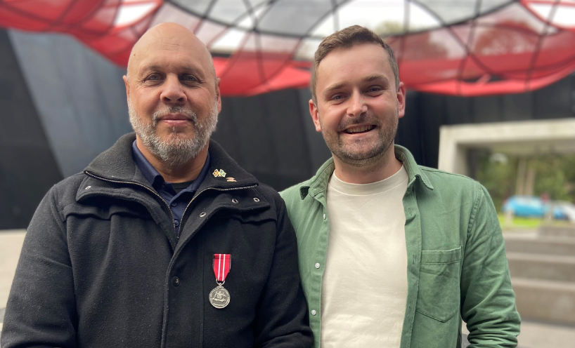 Rex Solomon and Tom Molyneux standing next to each other smiling. 