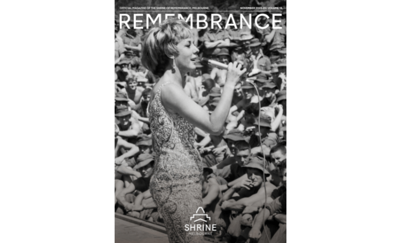 The cover of Remembrance magazine 2022, which features an image of performer Lorrae Desmond singing to a crowd of soldiers. 