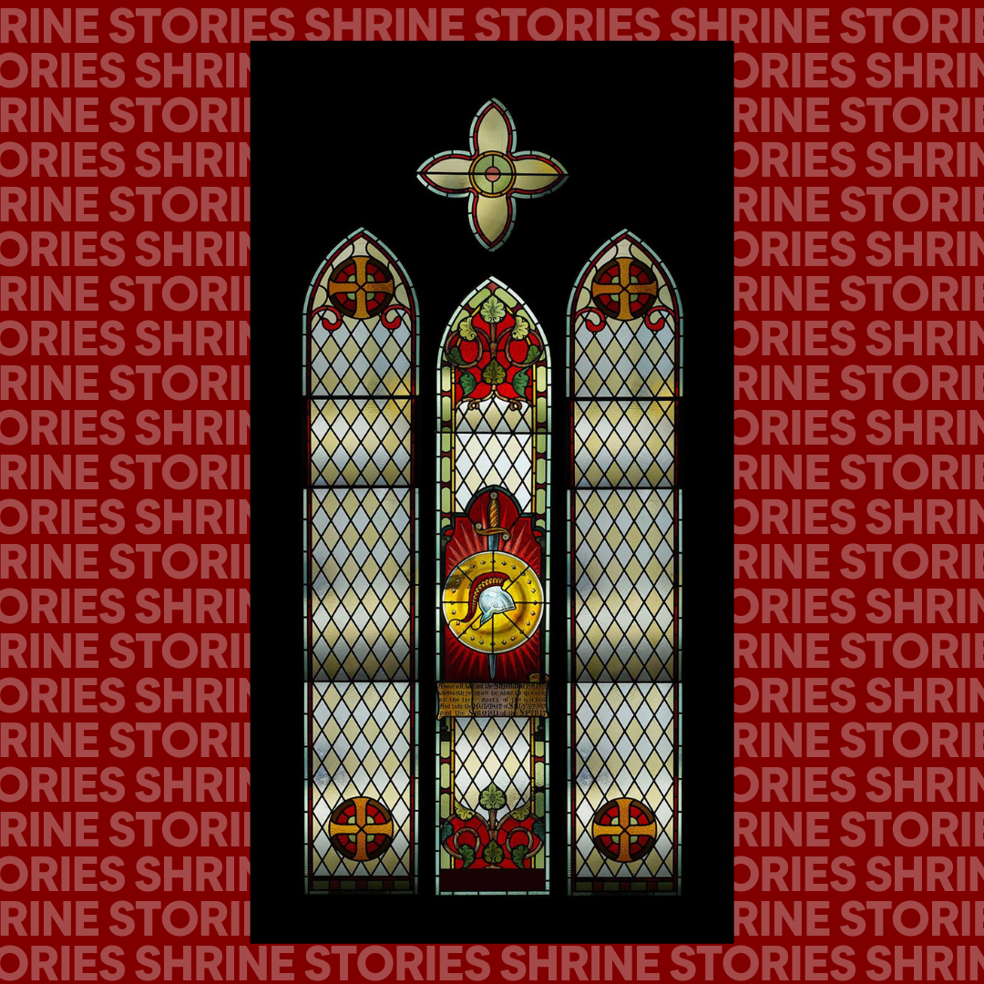 A stained glass window in the panels. The centre panel has a helmet and sword in the centre, in front of a large, round, yellow shield. There are floral embellishments at the top and bottom of this window. The other windows feature a diamond yellow and white feature. 