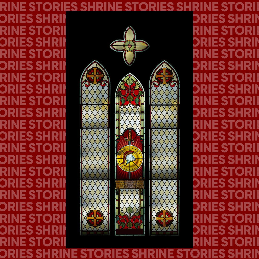 A stained glass window in the panels. The centre panel has a helmet and sword in the centre, in front of a large, round, yellow shield. There are floral embellishments at the top and bottom of this window. The other windows feature a diamond yellow and white feature.