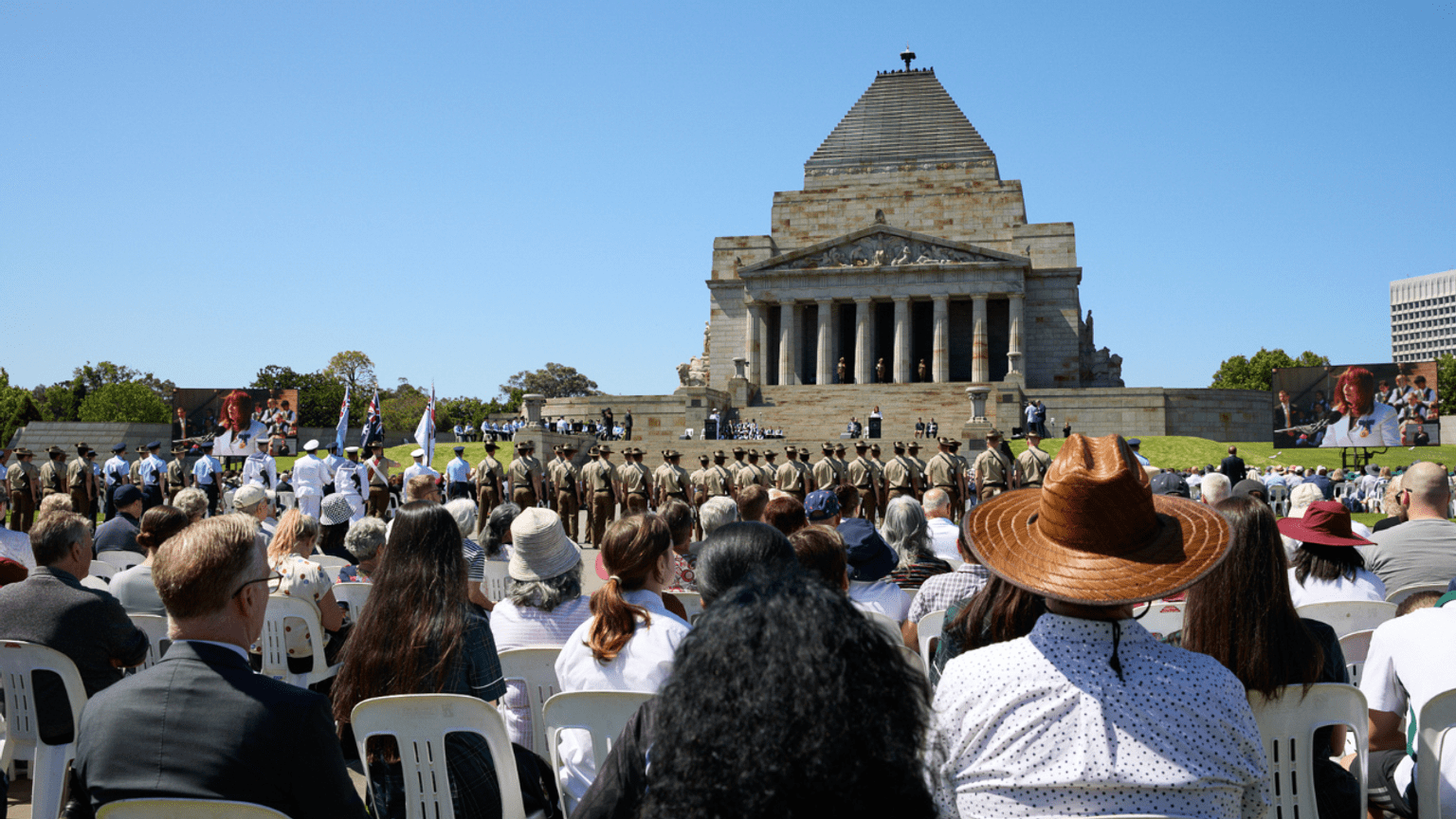 Crowds watch the 2024 Remembrance Day Service at the Shrine